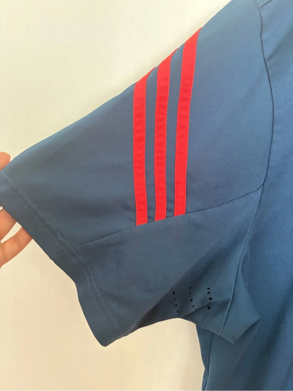 adidas Blue Polo Shirt with Red Sleeve Stripes